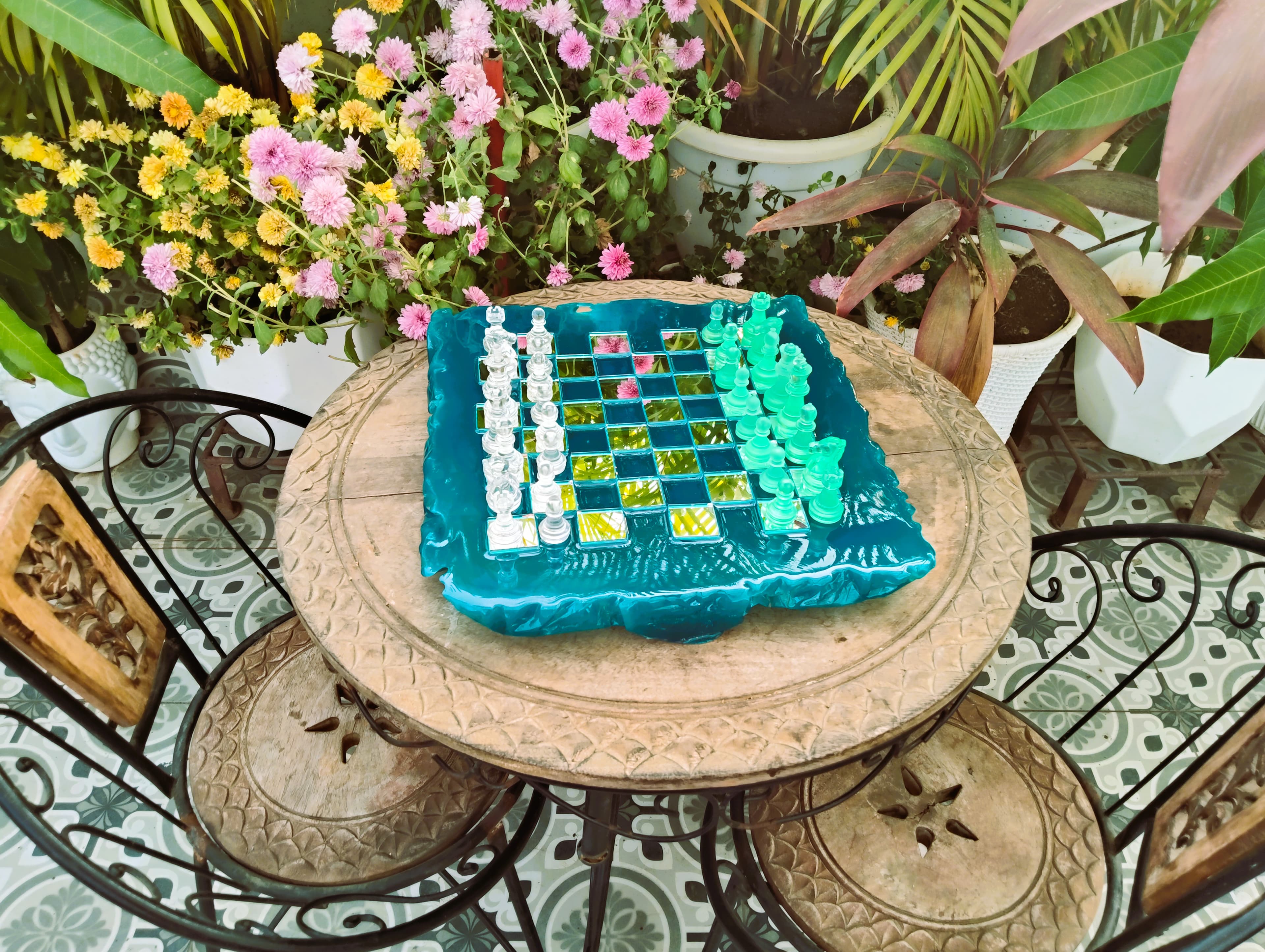 Artisan carefully working on a resin table